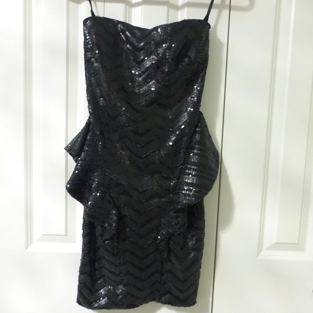 BEBE black sequins strapless peplum party dress